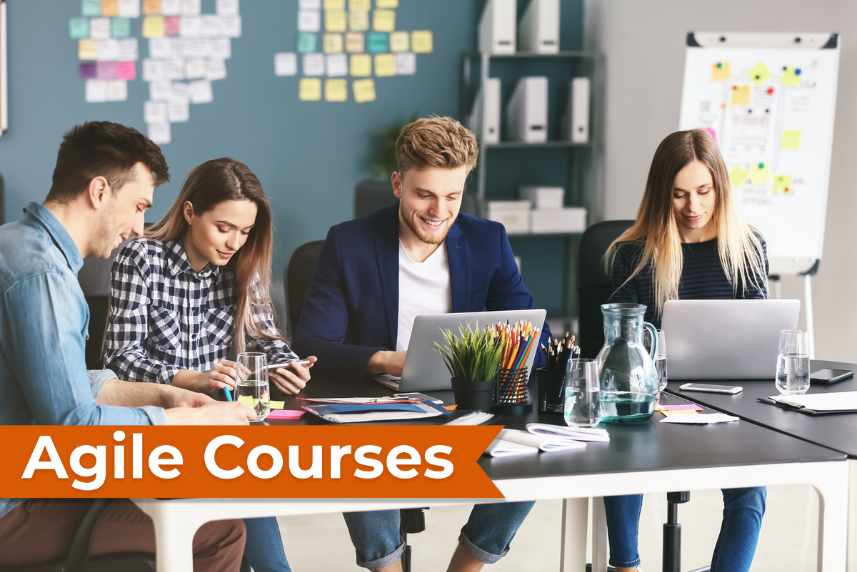 Four students behind a table